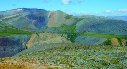 Photo 2013-240 : View looking north-northwest along the Conundrum Fault in the Tigonankweine Range of the Mackenzie Mountains - this steeply-dipping reverse fault,  ...