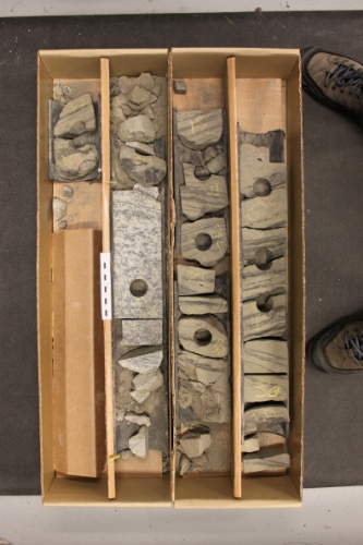 Photo 2019-439: Photographs of core 2, Ogmund E-72 showing the cemented zone near the base and a rubbly section near the top of the core. Scale bars are 10 cm in  ...
