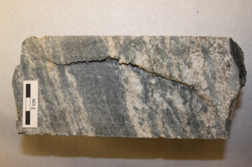 Photo 2019-498 : Photographs of the gneissic basement rock from core 7 of Skolp E-07, showing mostly mafic mineral banding, as well as fractures (A), more localized  ...