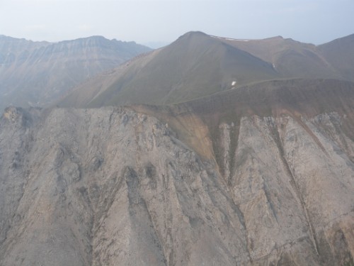 Photo 2019-778: Overview of the unconformable contact between Coppercap Formation and Sayunei Formation; view looking southwest