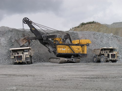 Photo 2020-124: Haul trucks and excavator at Gibraltar Mine, south-central British Columbia