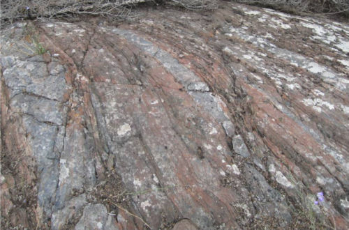 Photo 2020-587 : Stratabound magnetite alteration of metasiltstone producing layered ironstones