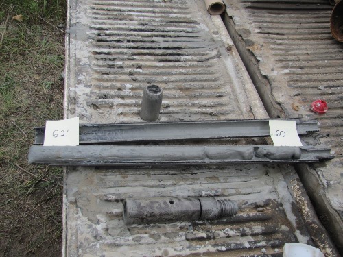 Photo 2020-665 : Split-spoon core sample from the stratigraphic borehole interval 60-62 ft