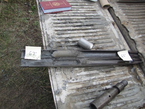 Photo 2020-667 : Split-spoon core sample from the stratigraphic borehole interval 65-67 ft