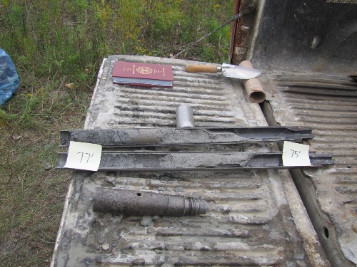 Photo 2020-671 : Split-spoon core sample from the stratigraphic borehole interval 75-77 ft