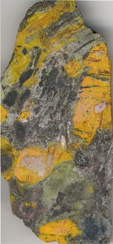 Photo 2020-758 : Cobaltinitrite-stained rock slab of Mile Lake breccia where skarn assemblages infill breccia matrix and K-feldspar alteration (yellow stain) replaces  ...