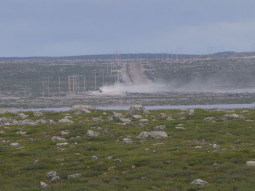 Photo 2022-315: Dust plume from traffic along the main mining road at the Ekati Mine, NT.